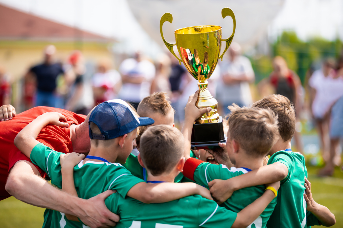 Young Sport Team with Trophy